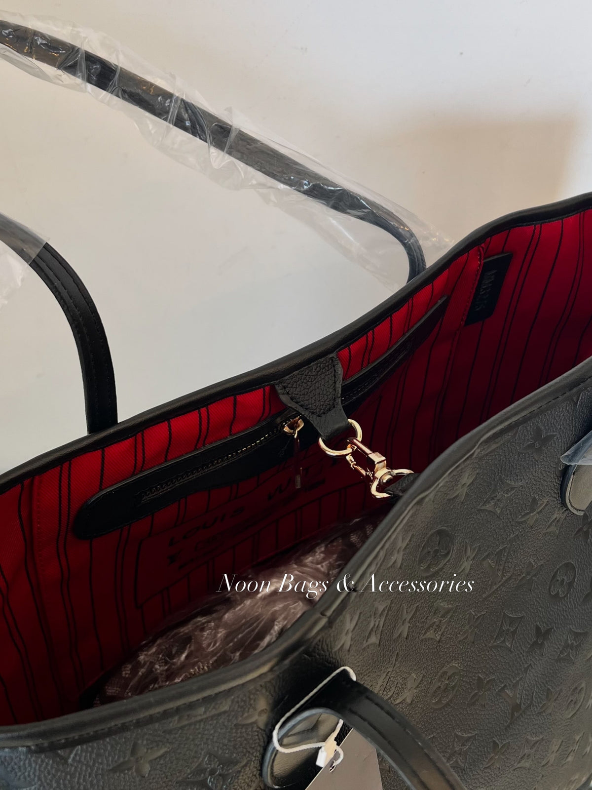 LV never full tote bag