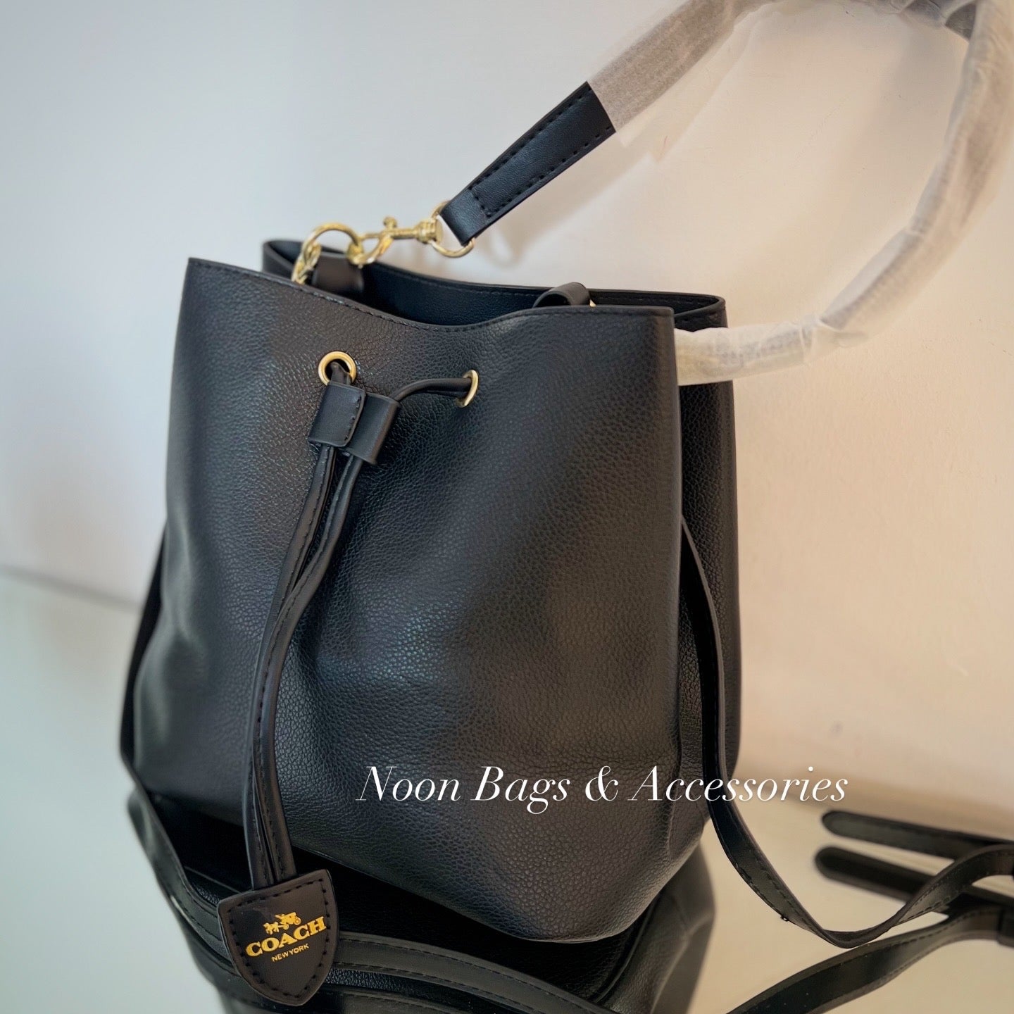 Coach bucket small size