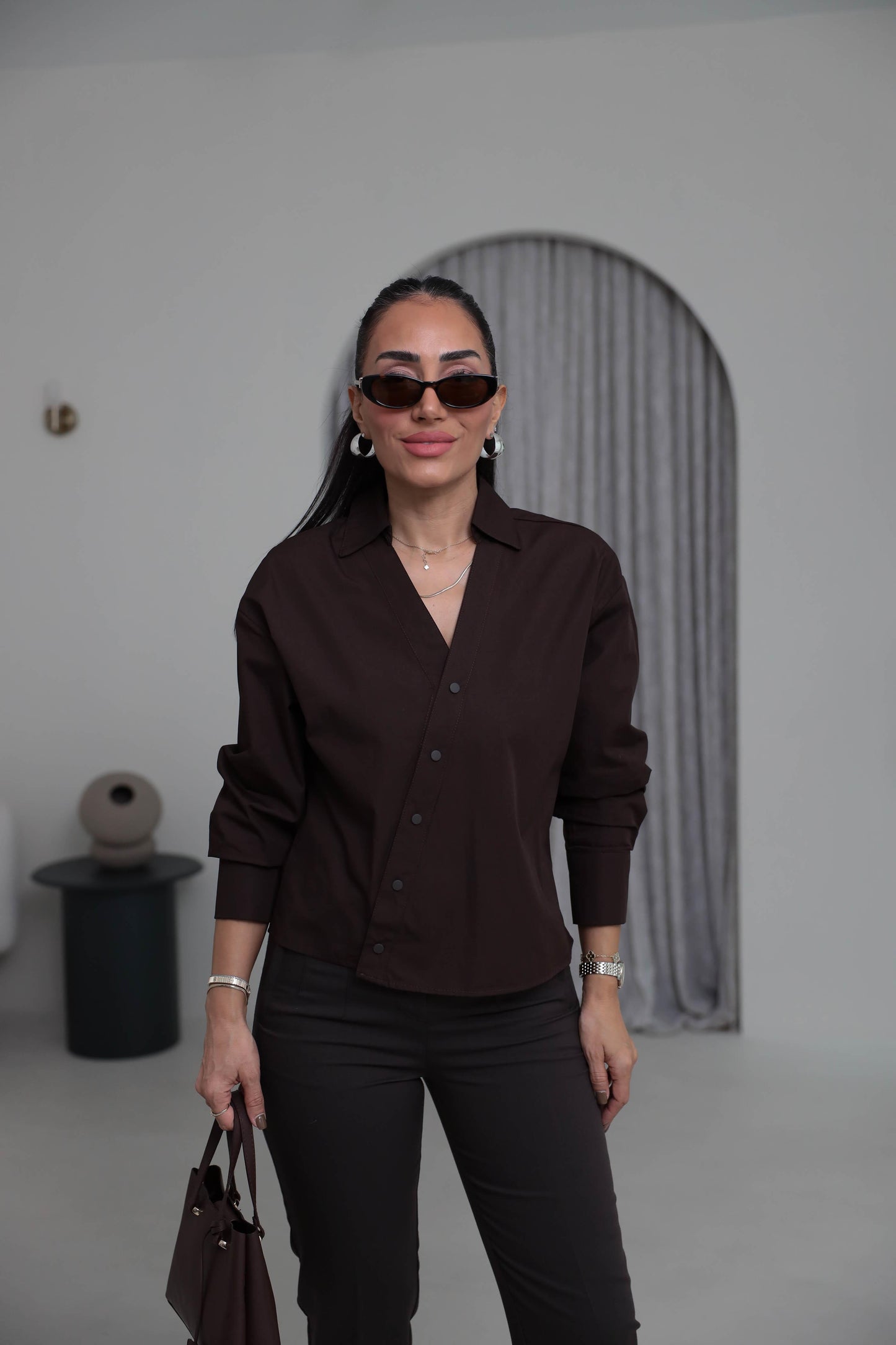 Two-piece shirt (wrappable like a skirt) in brown poplin fabric with an elegant design