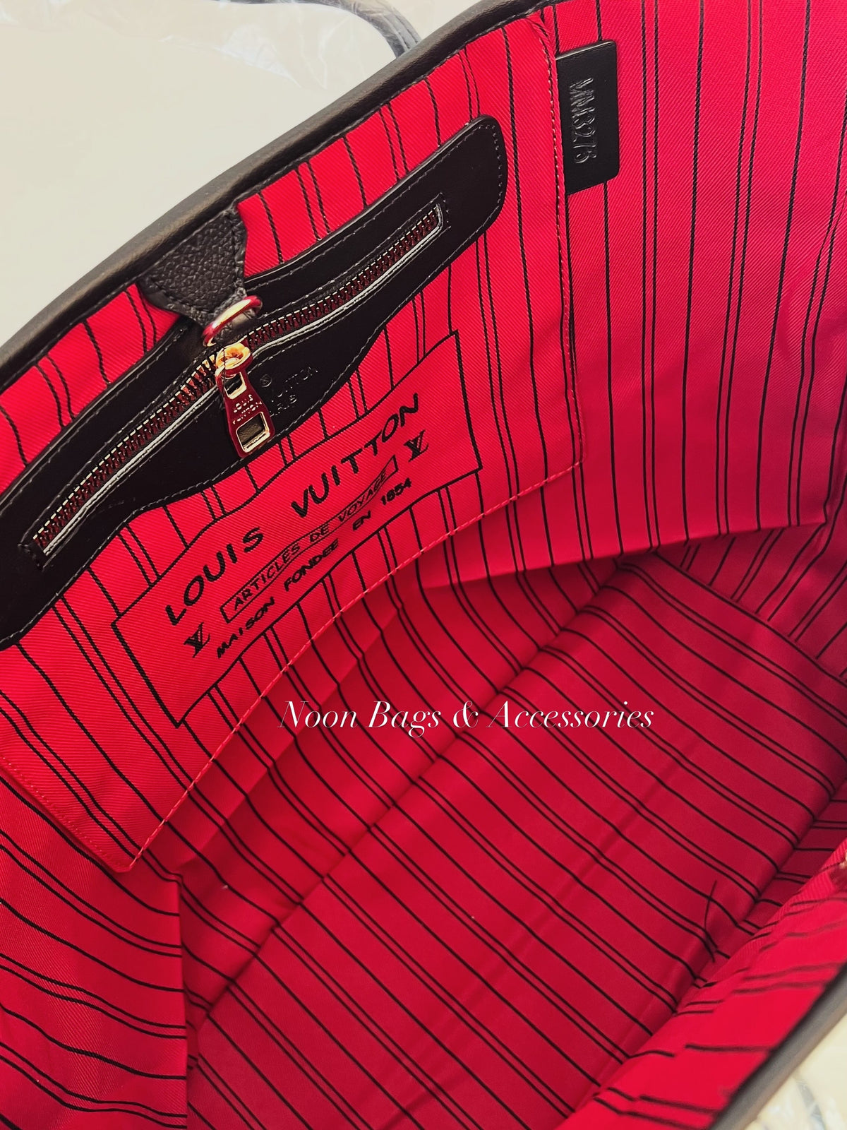 LV never full tote bag