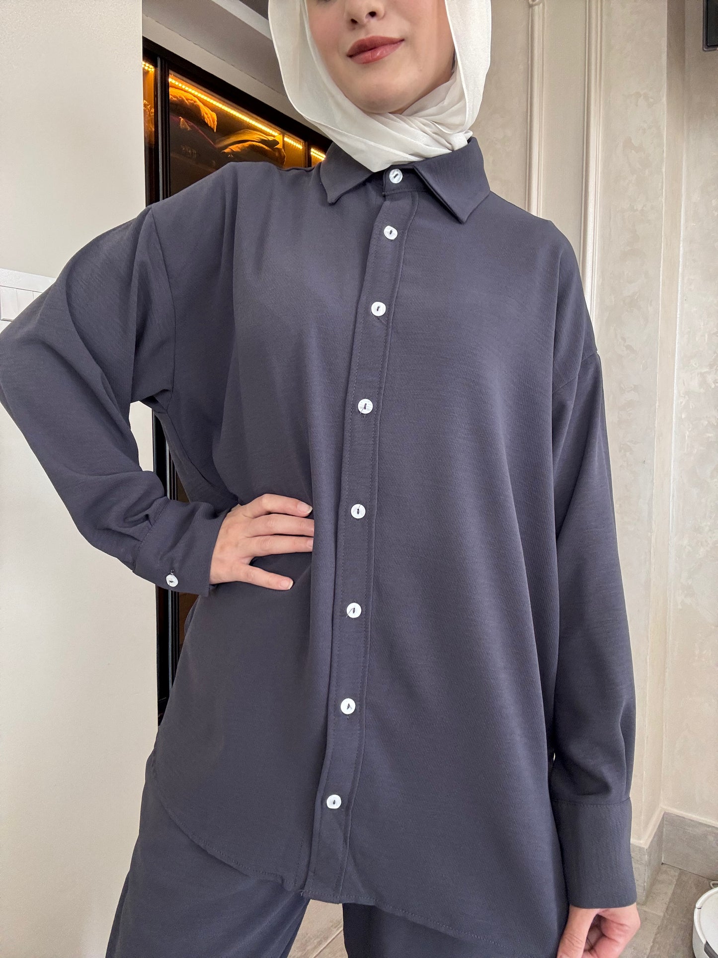 Oversized suit with back buttons on the shirt