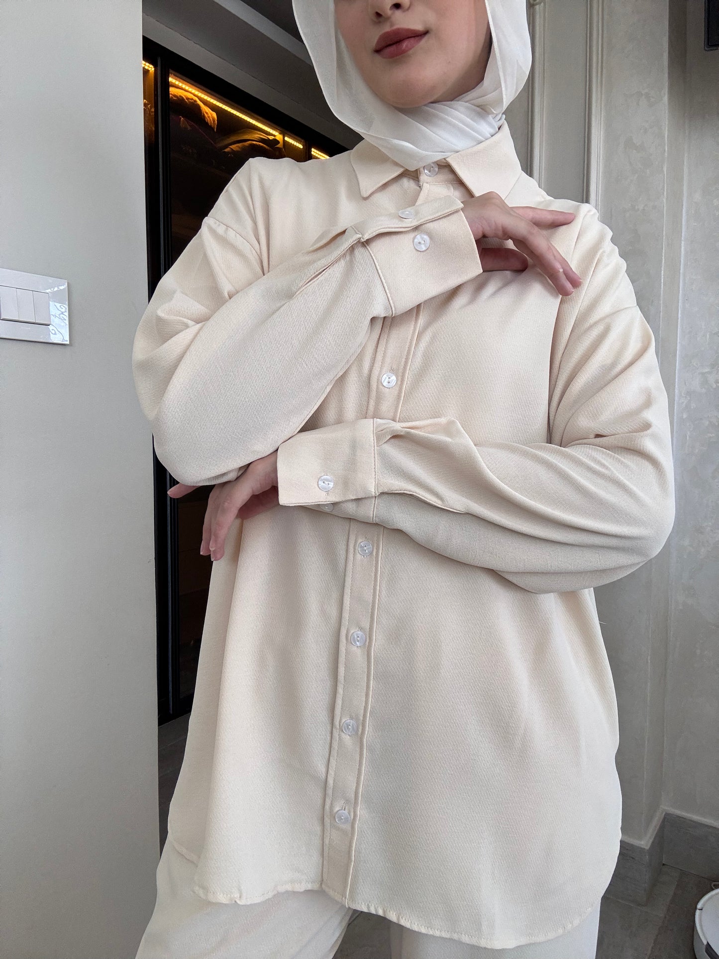 Oversized suit with back buttons on the shirt