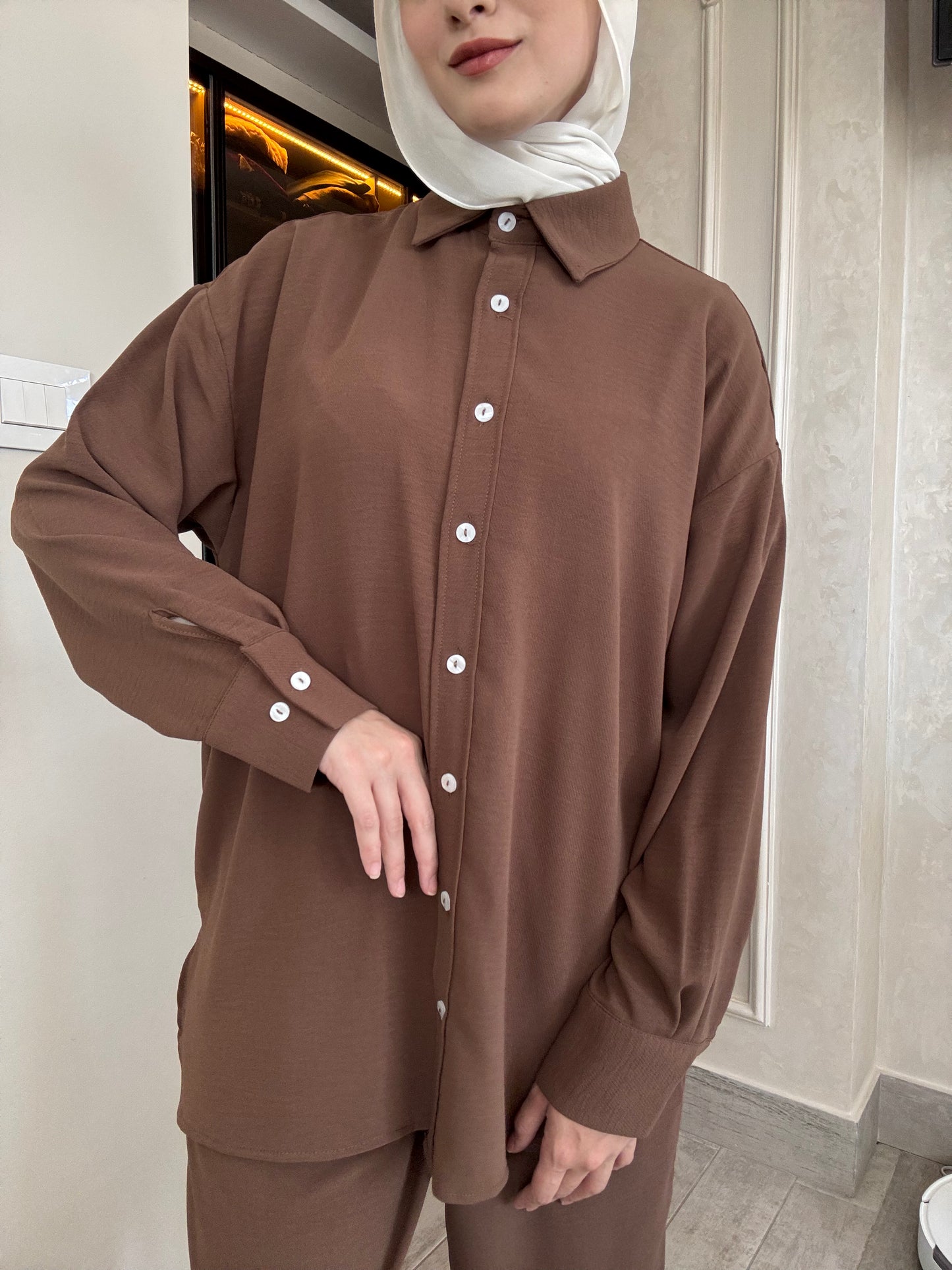 Oversized suit with back buttons on the shirt