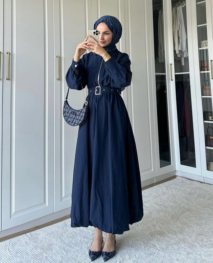 belted dress with puffy bottom