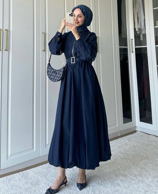 belted dress with puffy bottom