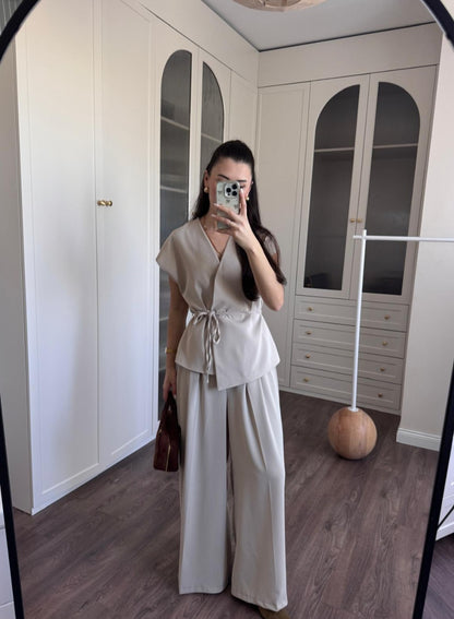 wrap belted vest with wide-leg trousers
