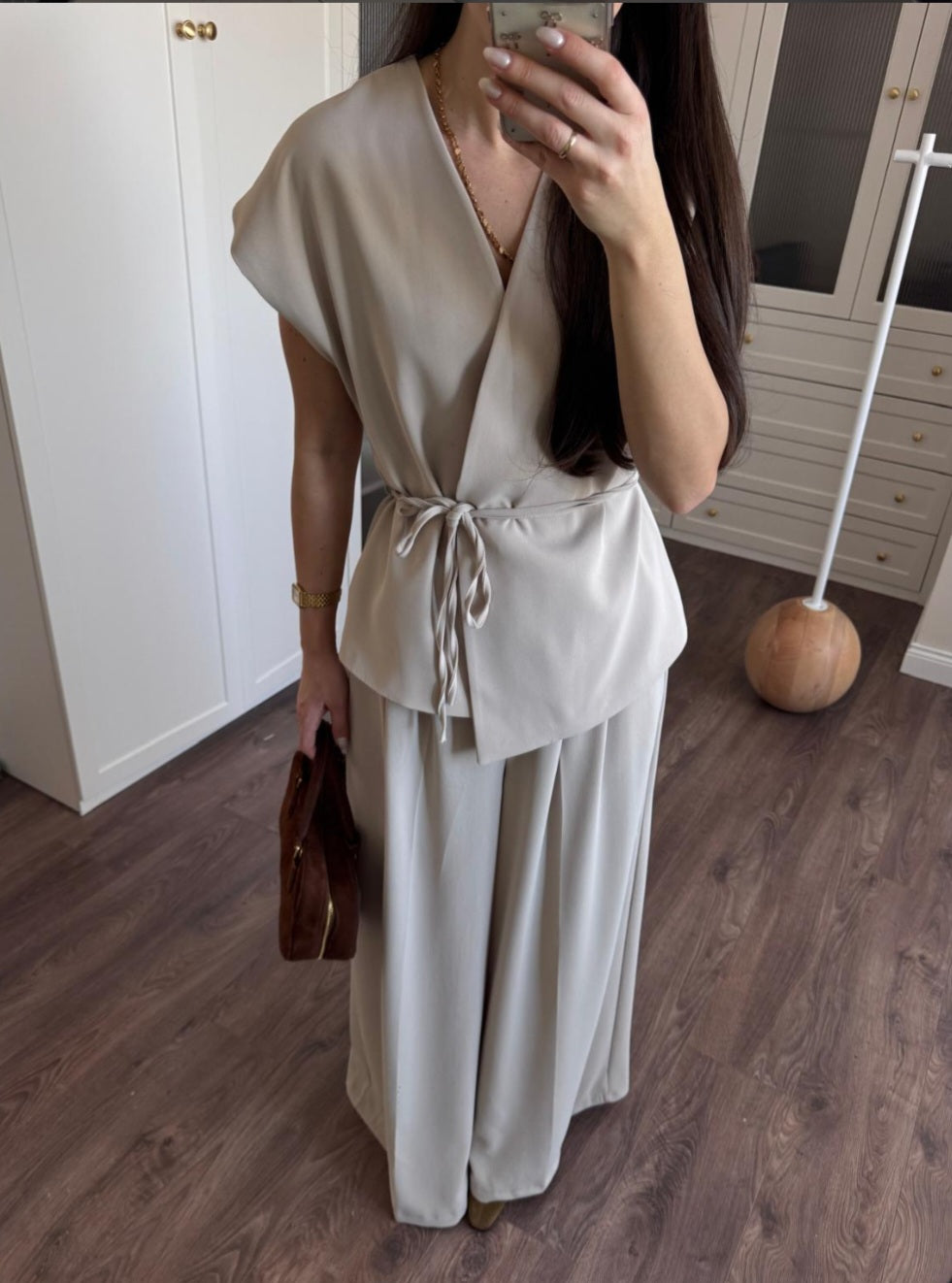 wrap belted vest with wide-leg trousers