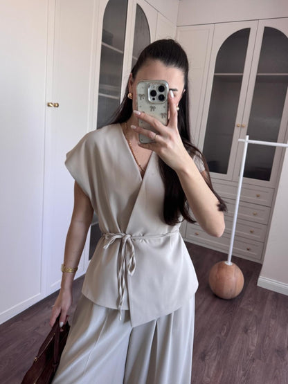 wrap belted vest with wide-leg trousers