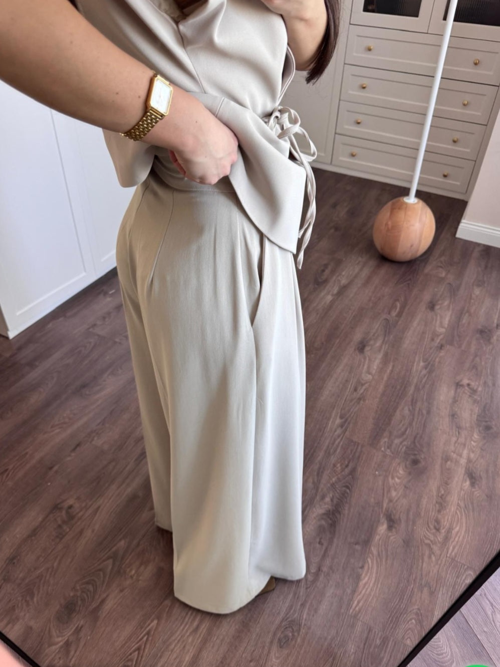 wrap belted vest with wide-leg trousers