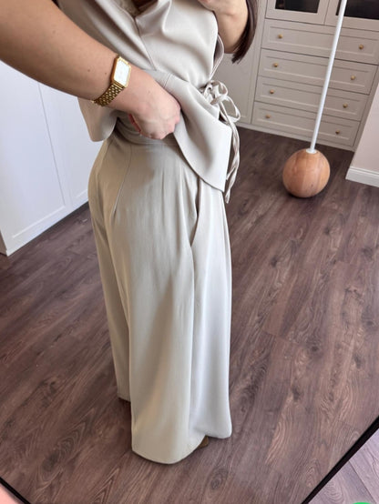 wrap belted vest with wide-leg trousers