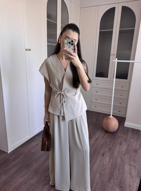 wrap belted vest with wide-leg trousers