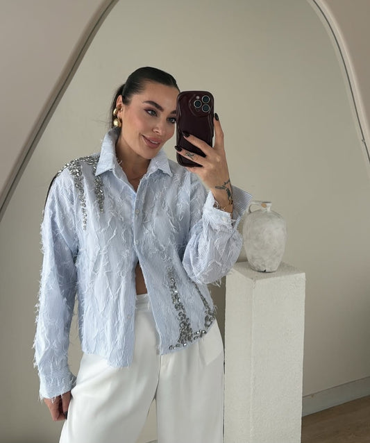 Feathered shirt with rhinestone details