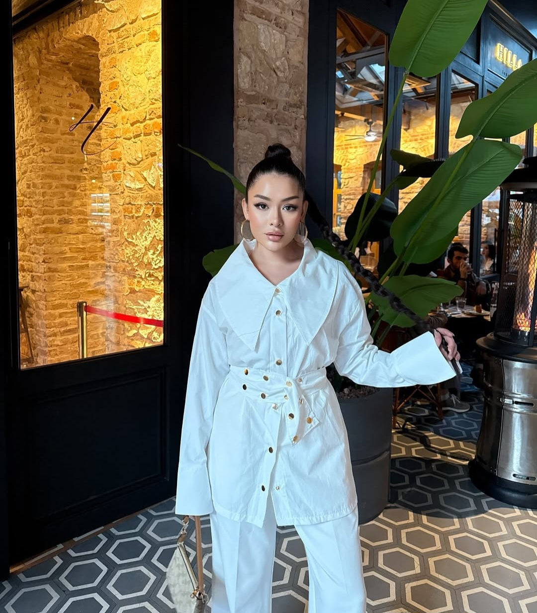 Shirt with metal buttons