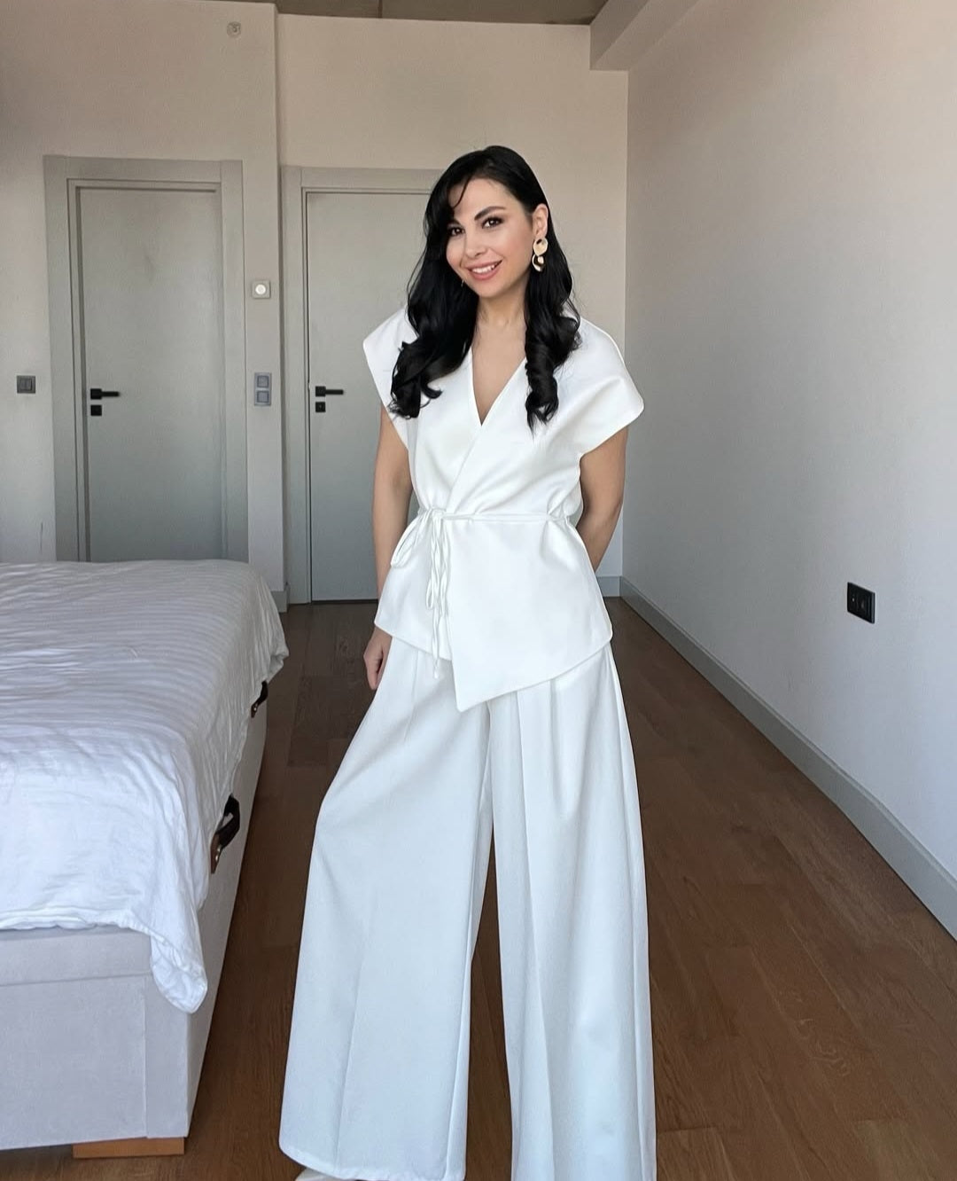wrap belted vest with wide-leg trousers