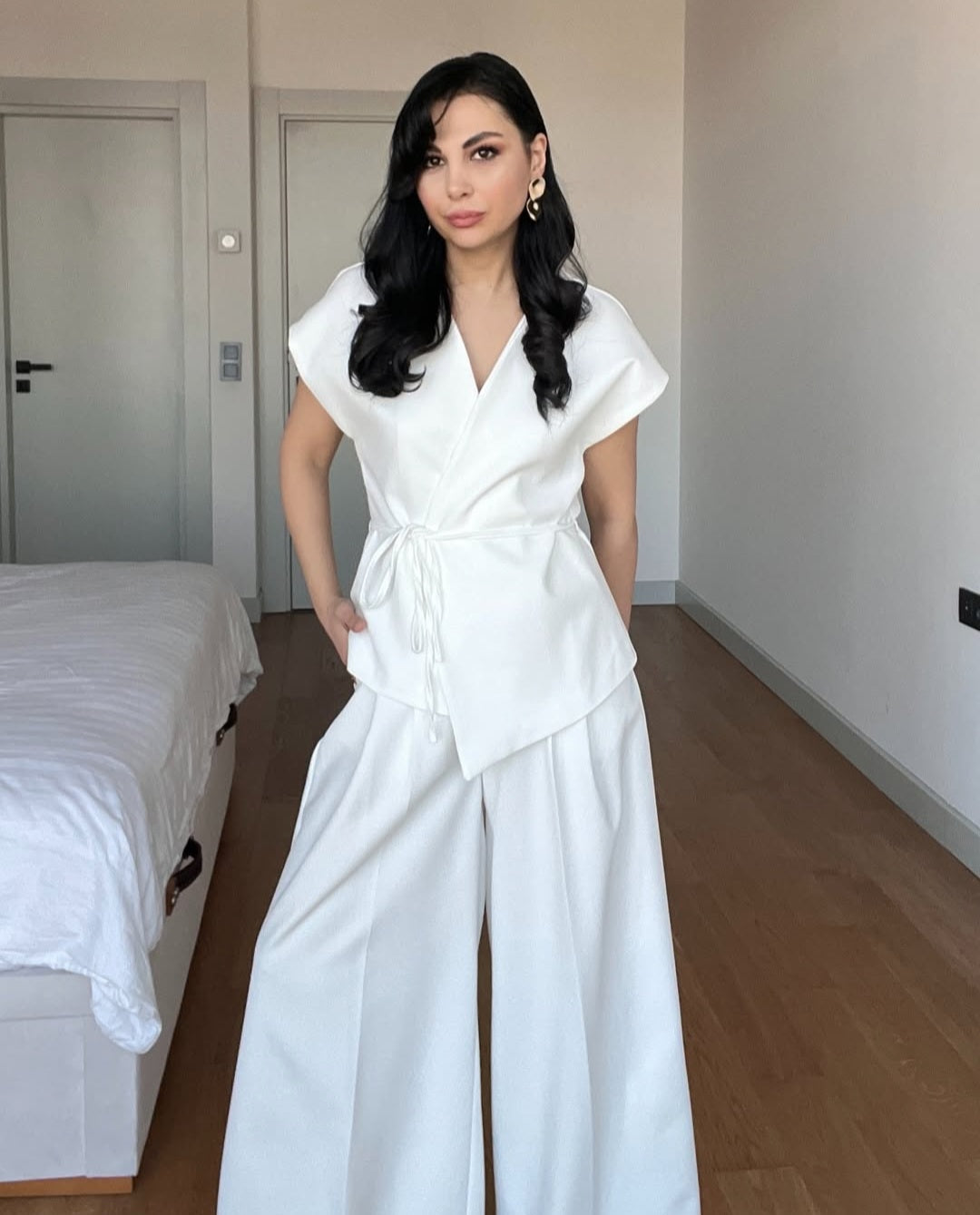 wrap belted vest with wide-leg trousers