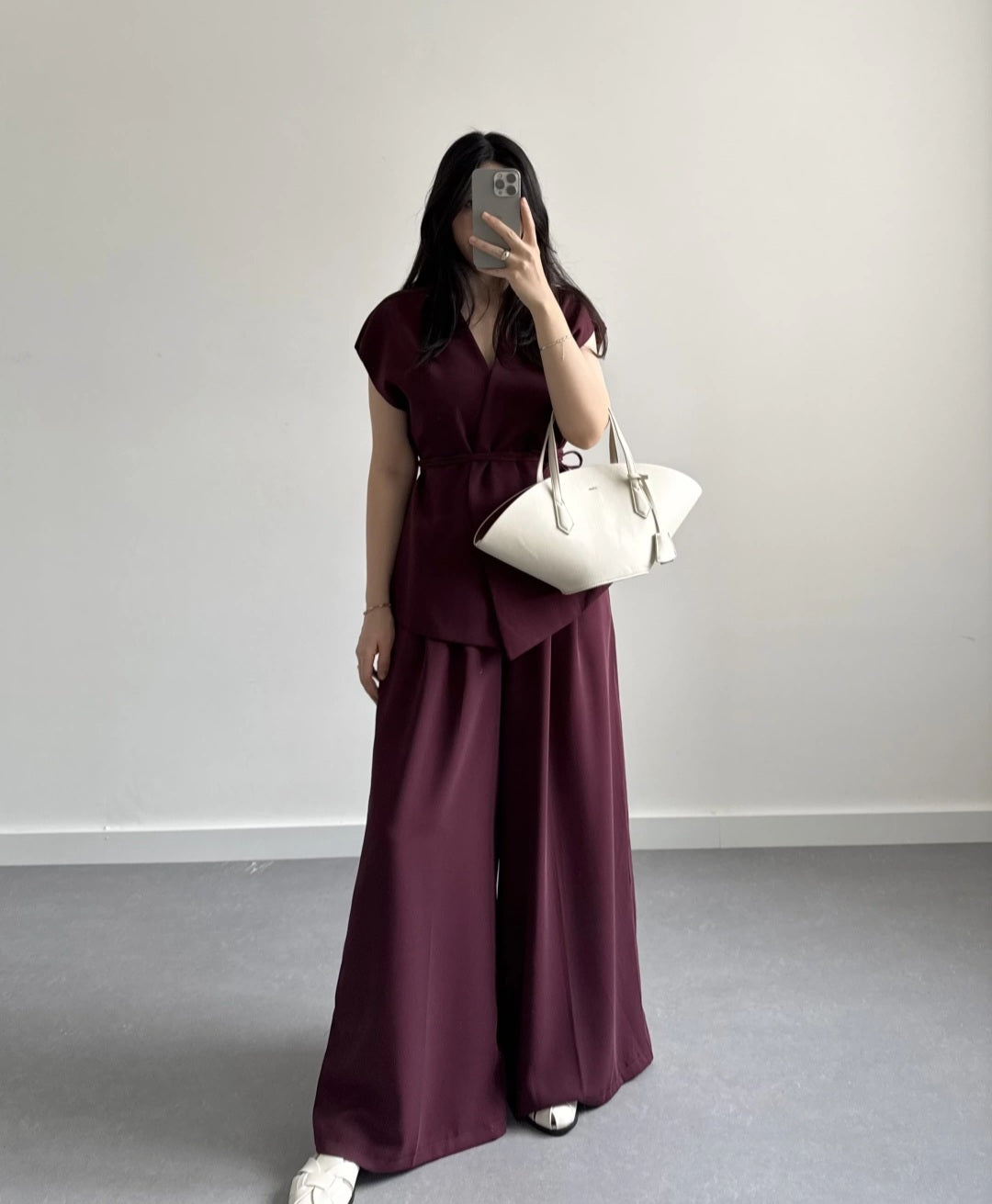 wrap belted vest with wide-leg trousers
