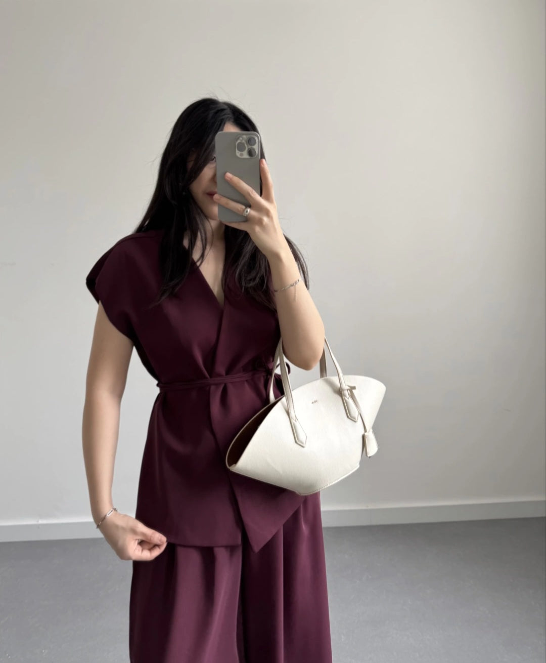 wrap belted vest with wide-leg trousers