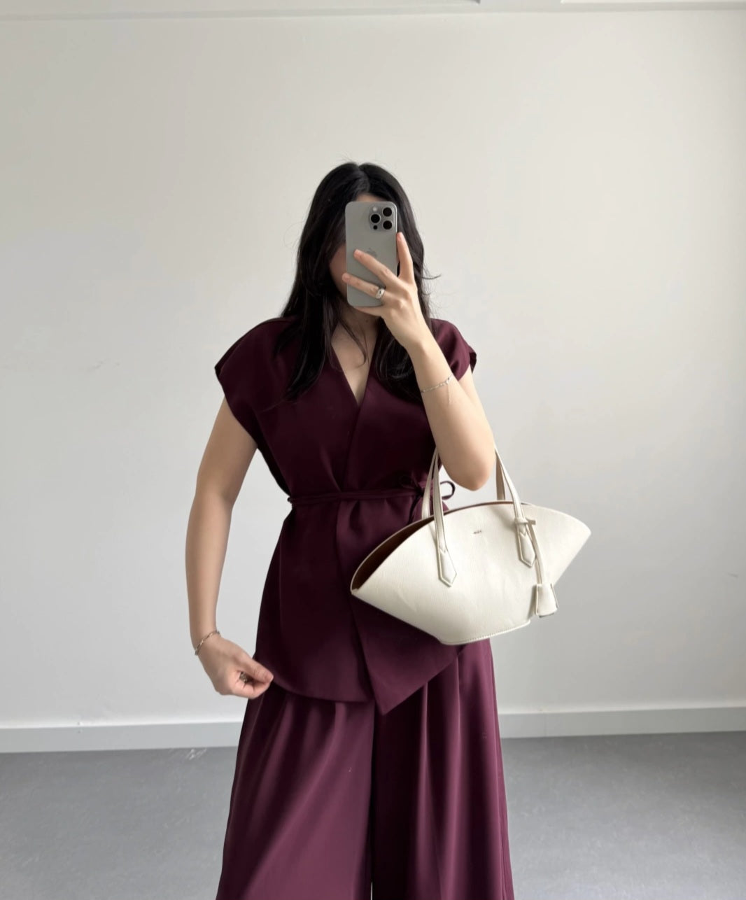 wrap belted vest with wide-leg trousers