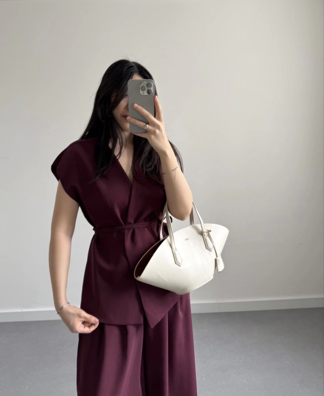 wrap belted vest with wide-leg trousers