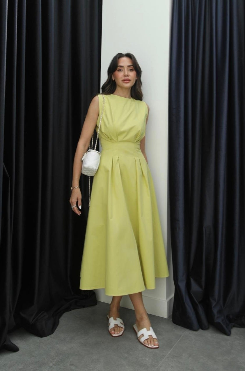 Sleeveless poplin dress with pleats