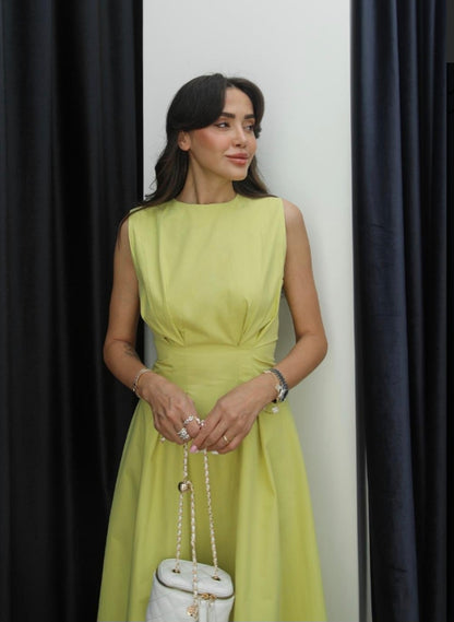 Sleeveless poplin dress with pleats
