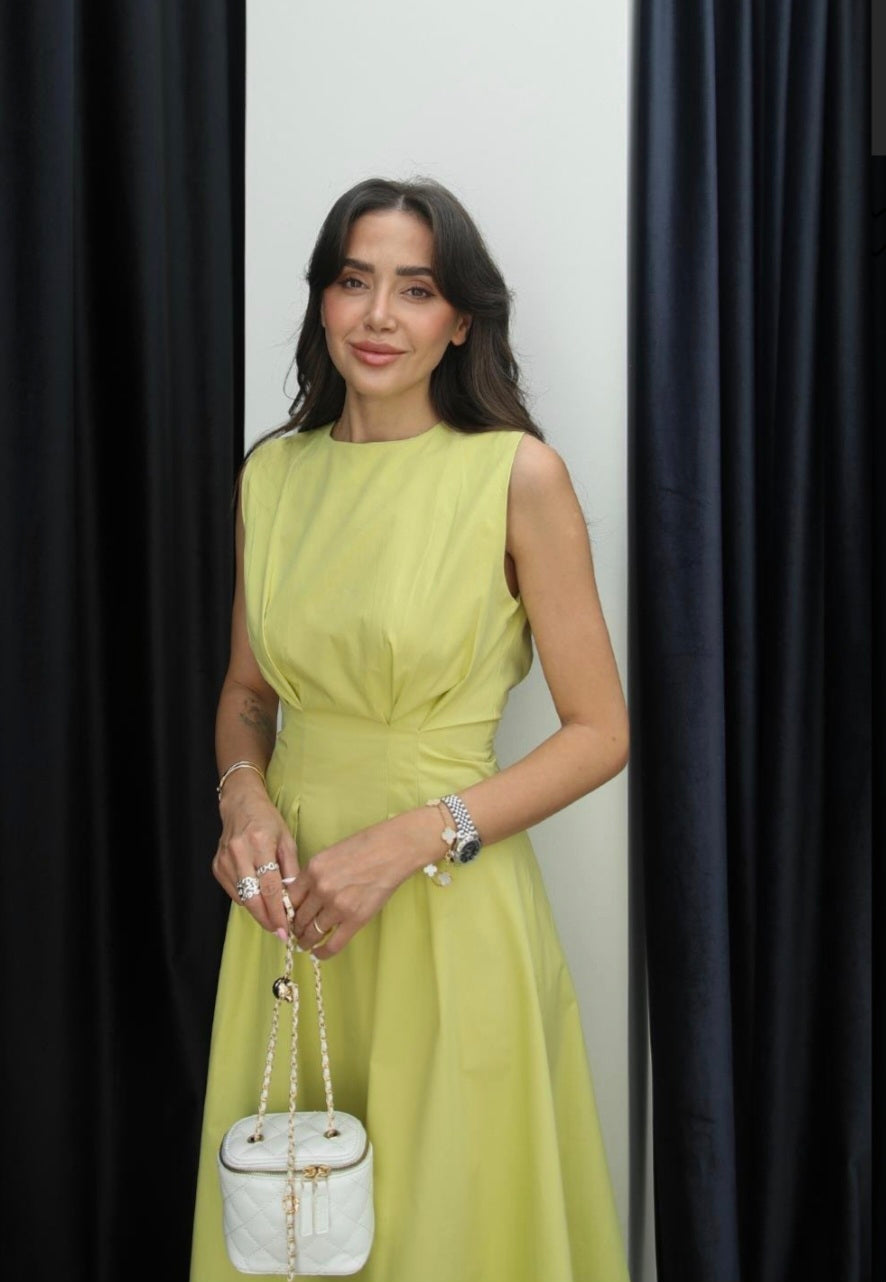Sleeveless poplin dress with pleats