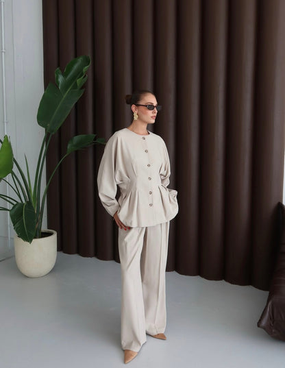 pleated shirt with an elasticated back. Straight-leg trouser co-ord set