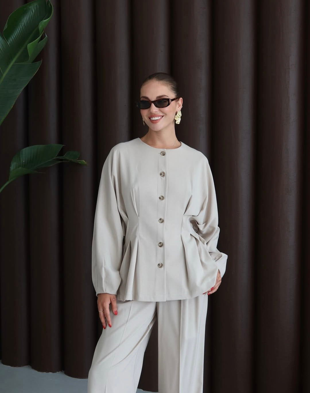 pleated shirt with an elasticated back. Straight-leg trouser co-ord set