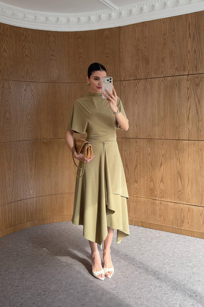 Zara model Loose-fitting top with crew neck  ,Flowing mid-waist midi skirt with an asymmetric hem.