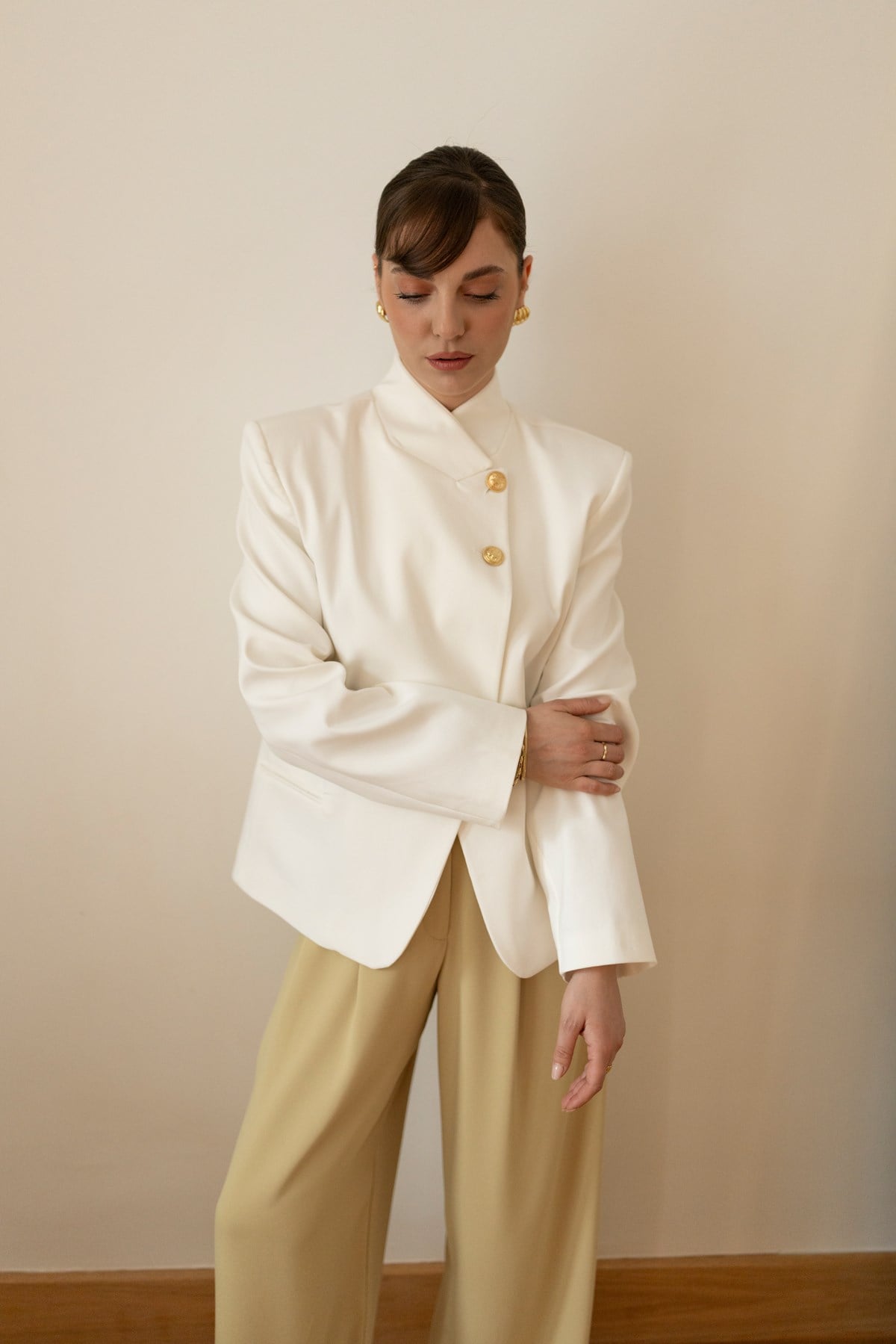 White Asymmetrical Jacket with Gold Button Details