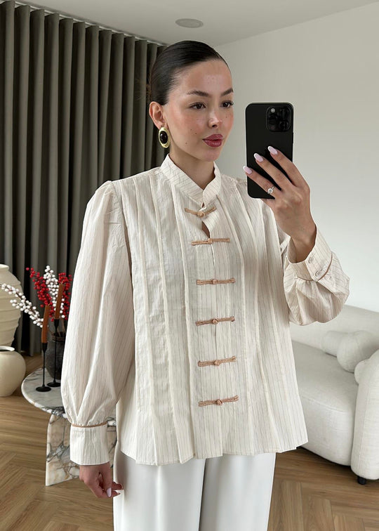 Beige Shirt with Red Button Detail and Mandarin Collar