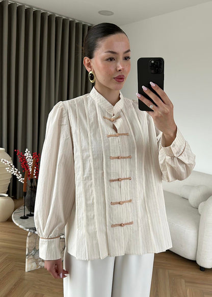 Beige Shirt with Red Button Detail and Mandarin Collar