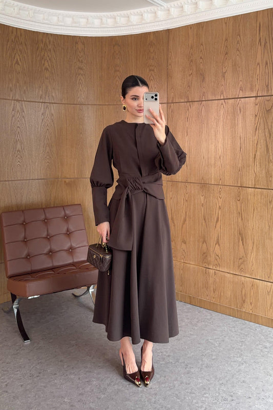 Long-sleeved shirt and wide skirt set with a fixed side belt at the waist.