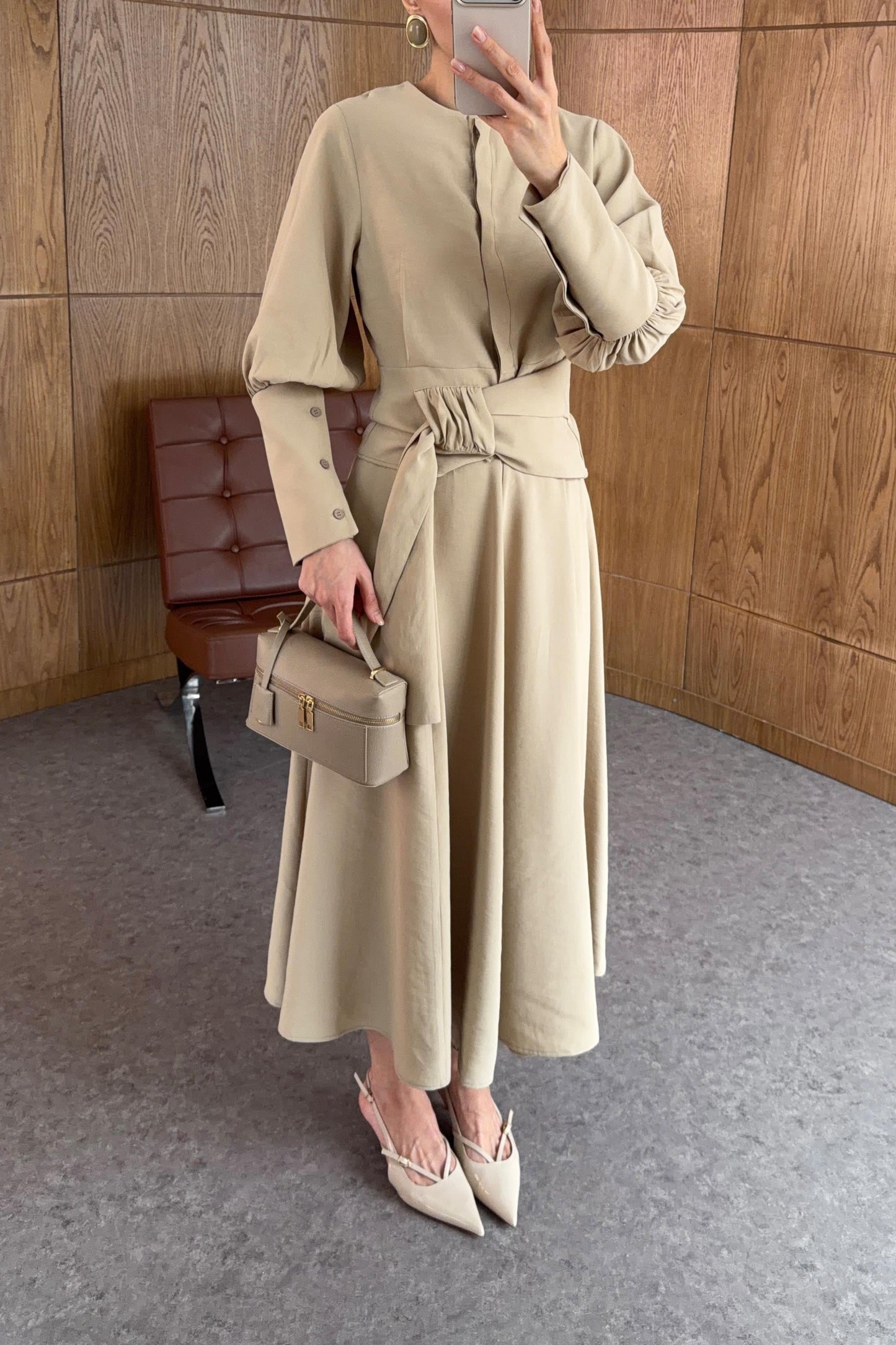 Long-sleeved shirt and wide skirt set with a fixed side belt at the waist.