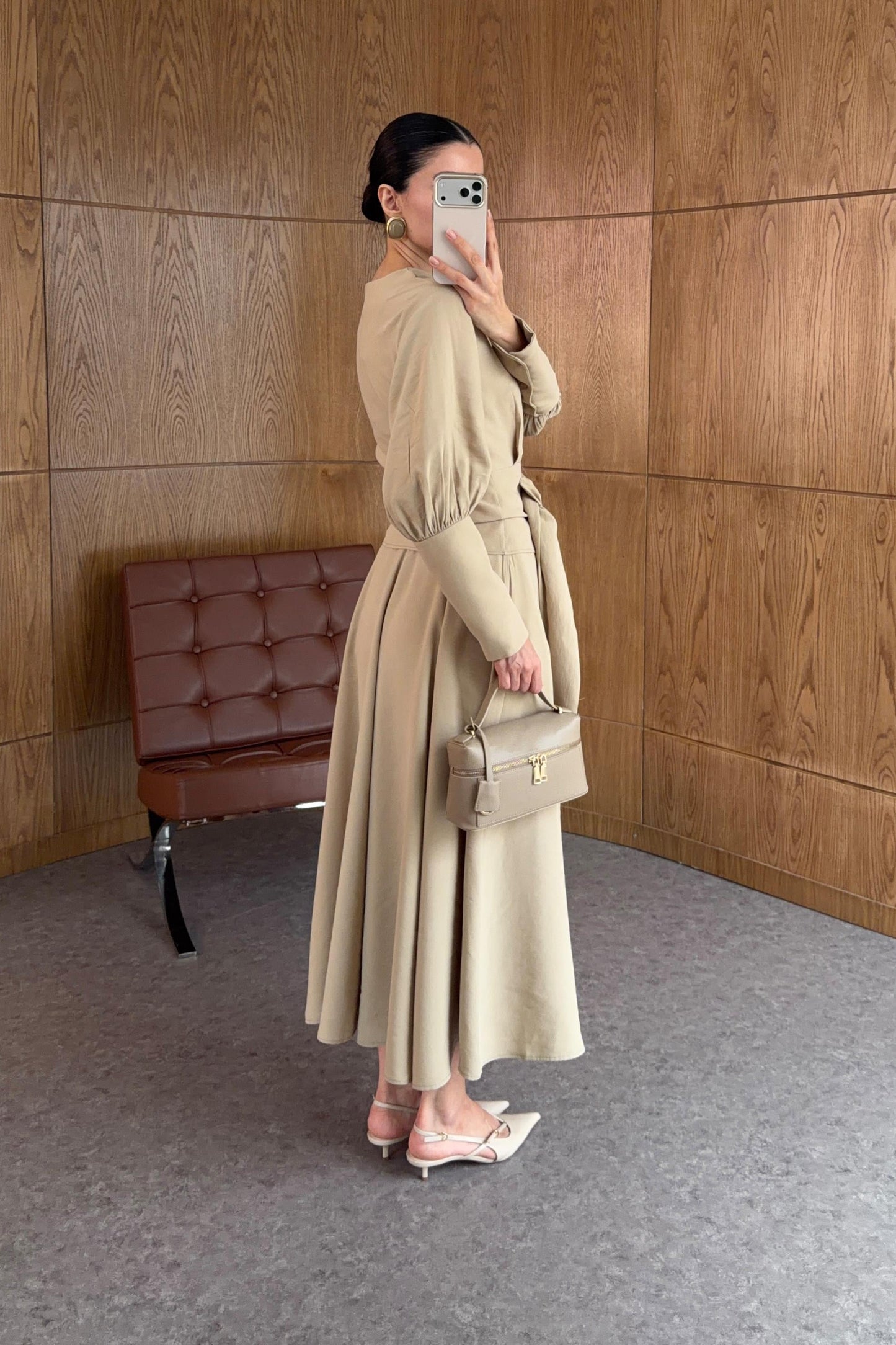 Long-sleeved shirt and wide skirt set with a fixed side belt at the waist.