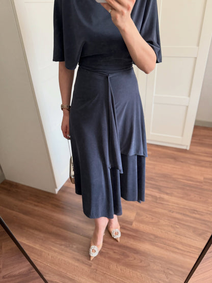 Zara model Loose-fitting top with crew neck  ,Flowing mid-waist midi skirt with an asymmetric hem.