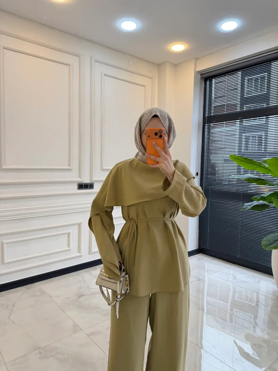 layered wrap cape-style overlay and a waist tie  with wide-leg pants co-ord set