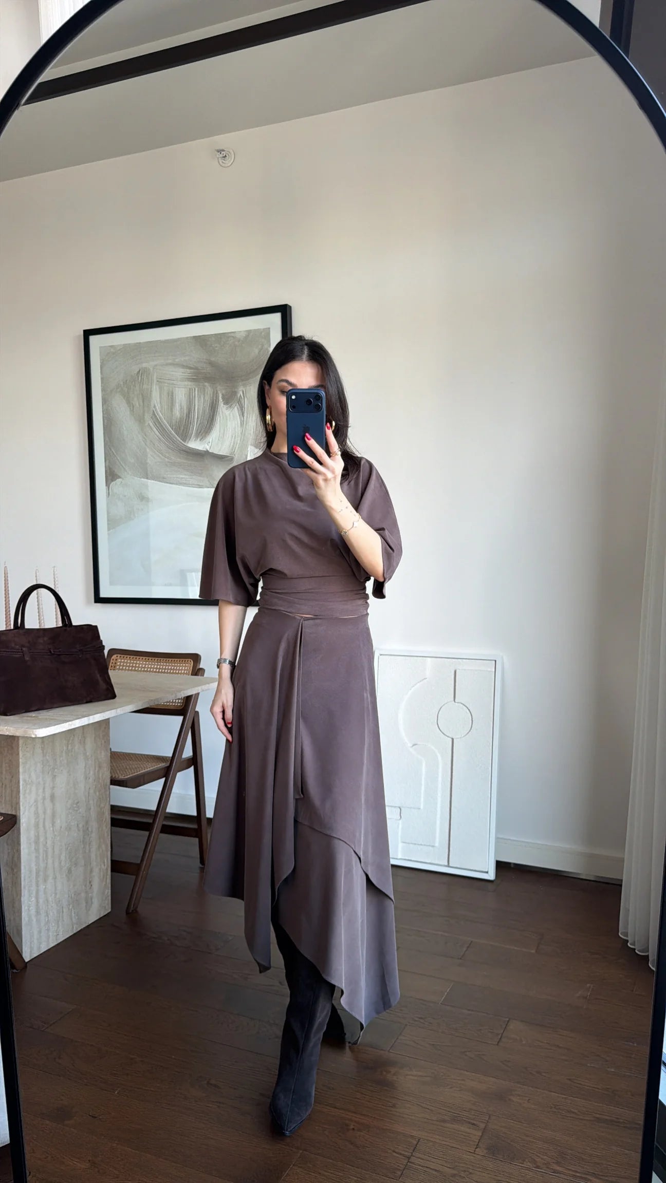 Zara model Loose-fitting top with crew neck  ,Flowing mid-waist midi skirt with an asymmetric hem.