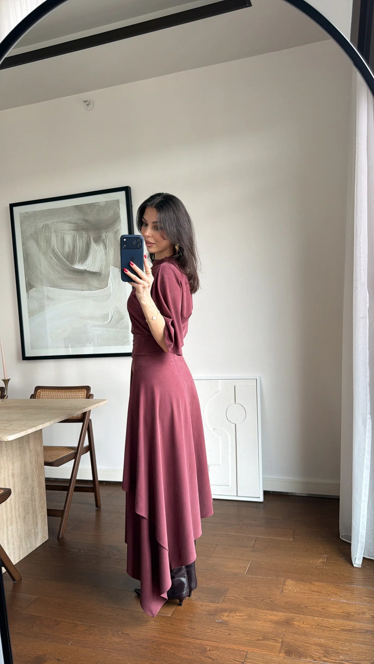 Zara model Loose-fitting top with crew neck  ,Flowing mid-waist midi skirt with an asymmetric hem.