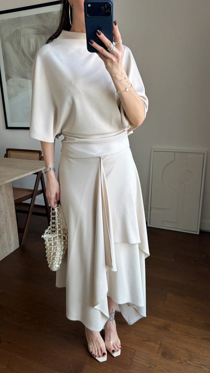 Zara model Loose-fitting top with crew neck  ,Flowing mid-waist midi skirt with an asymmetric hem.