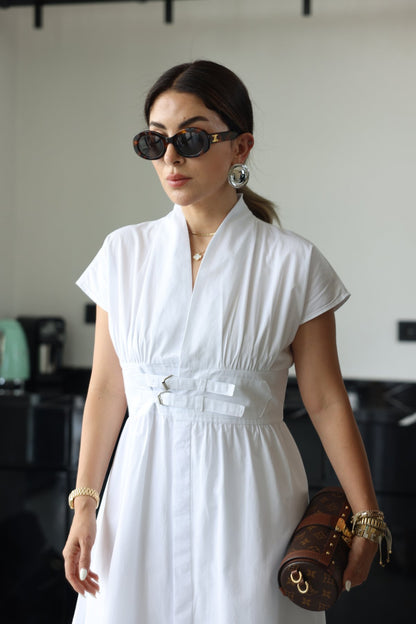 White half-sleeved dress with two belts on the chest
