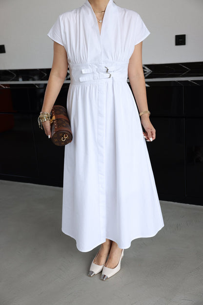White half-sleeved dress with two belts on the chest