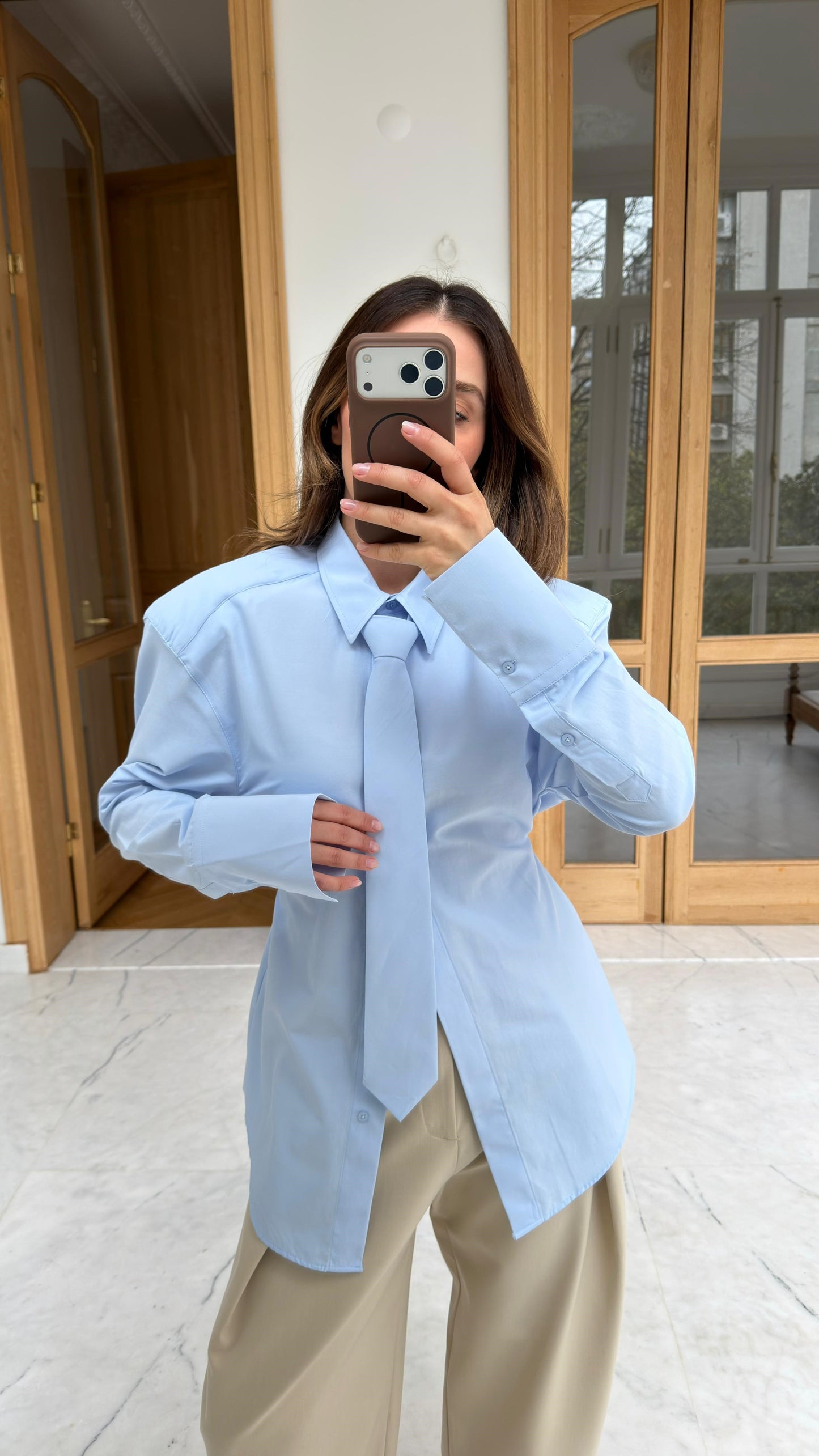Blue padded shirt with tie back