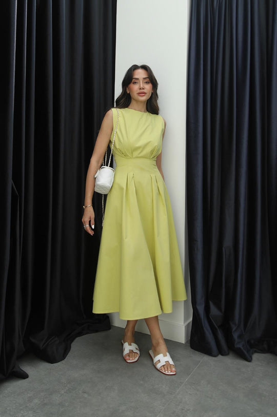 Sleeveless poplin dress with pleats