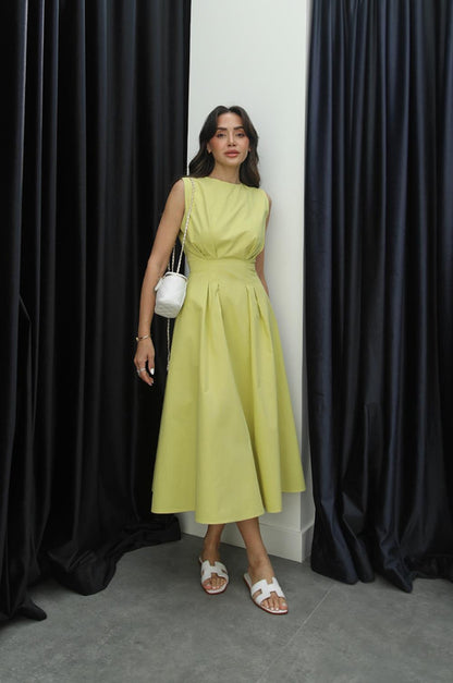 Sleeveless poplin dress with pleats