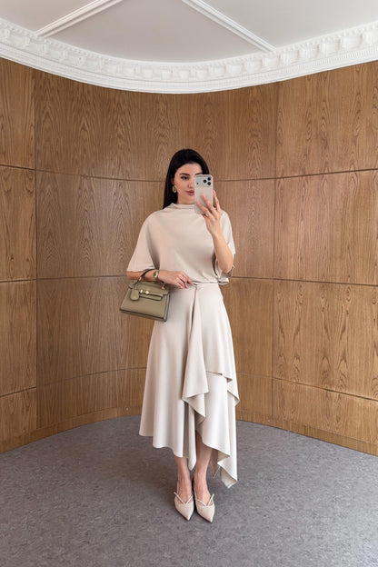 Zara model Loose-fitting top with crew neck  ,Flowing mid-waist midi skirt with an asymmetric hem.